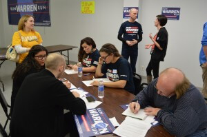 Warren supporters hit the phones at the end of the meeting