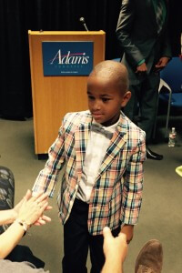 Adams' son Solomon wins the best dressed award for a campaign kick-off