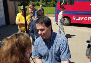 Scott Walker talks to a voter who had seen Marco Rubio the day before