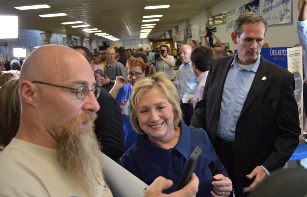 Hillary poses for pictures on Labor Day