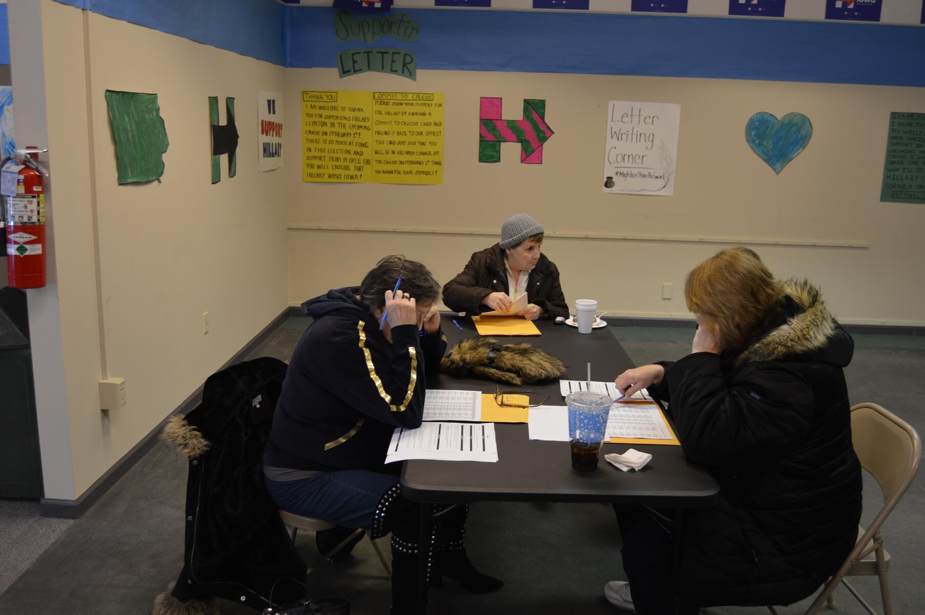 Volunteers phone bank in the back of the office