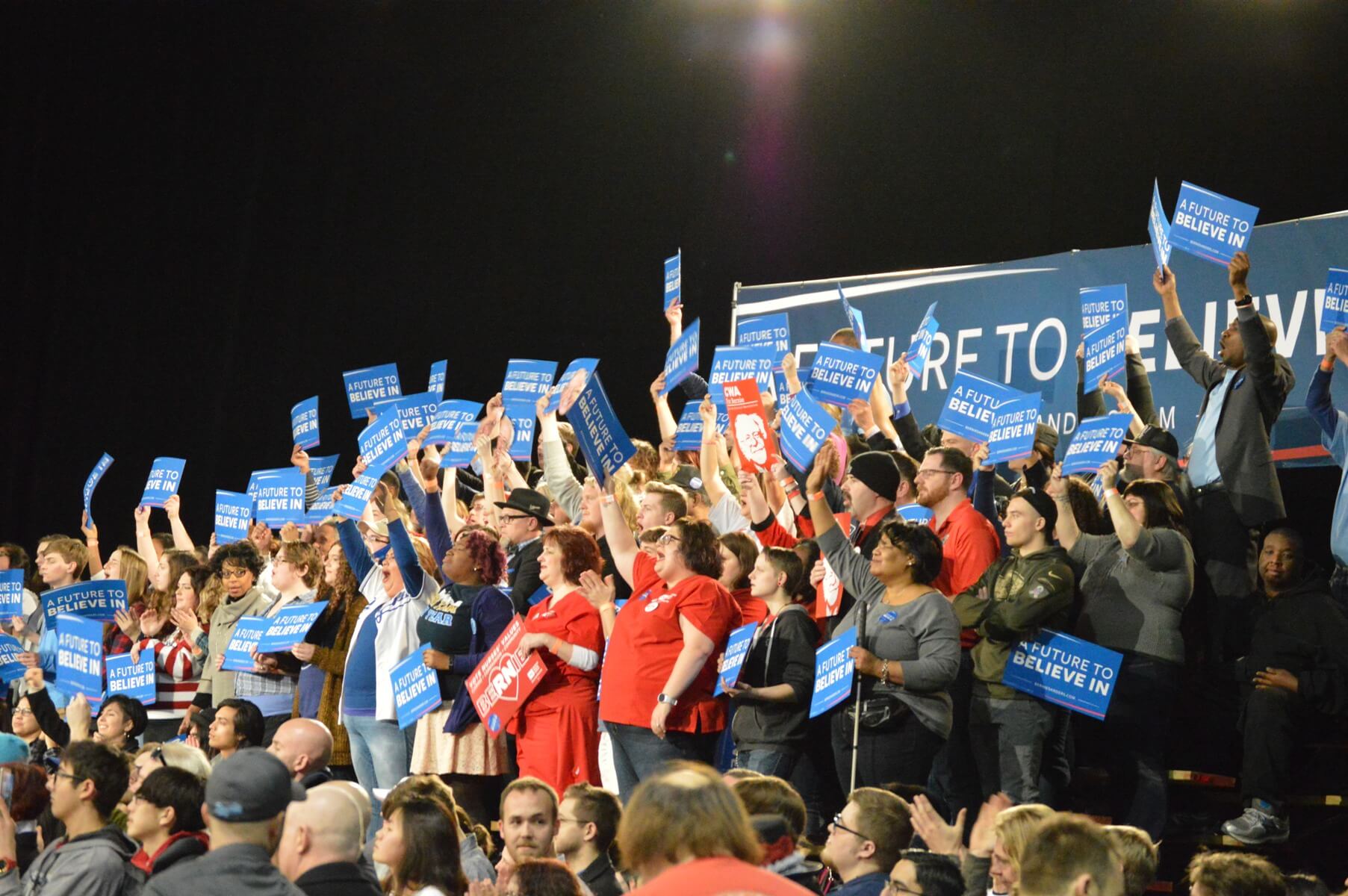 Supporters cheer at a Sanders rally in Kansas City