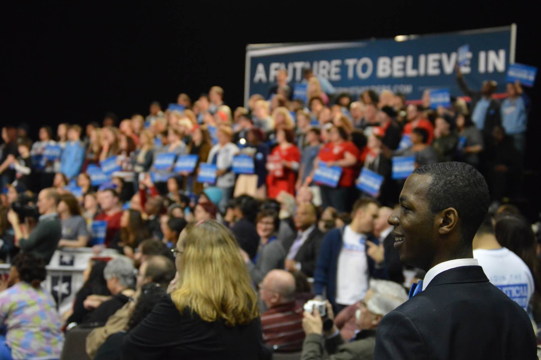 Kansas Dems ED Kerry Gooch looks out at potential new Democrats at Sanders rally