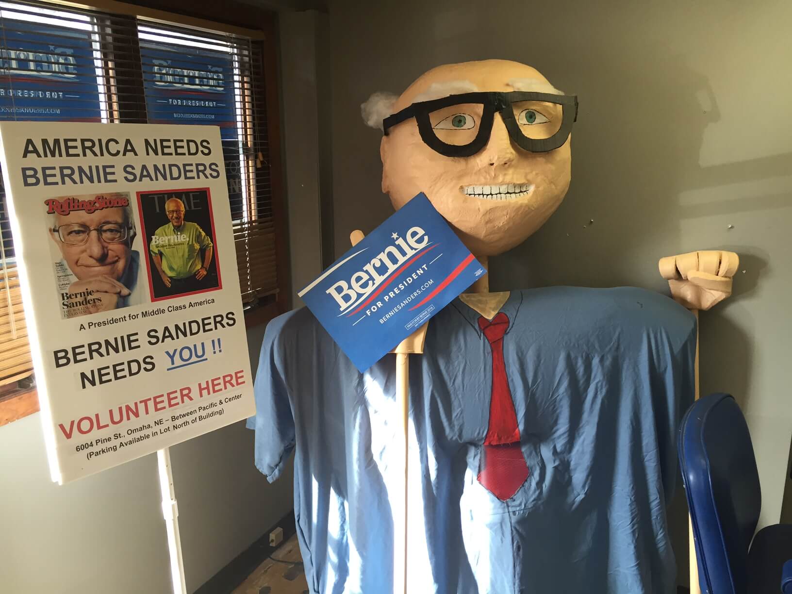 A giant Sanders puppet in their Omaha HQ