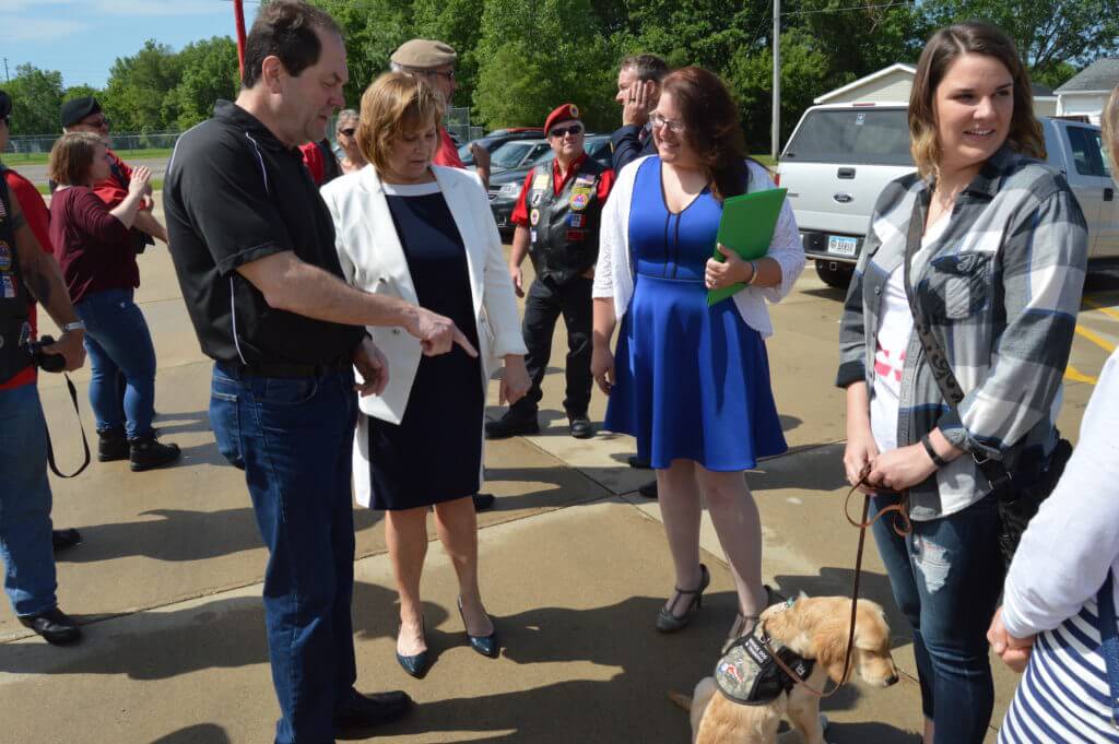 Vernon and Kressig meet a service dog in training